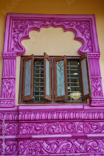 Картината върху платно An exterior shot of a local Hindu temple in the suburban neighbourhood of Kharadi, showcasing traditional Indian temple architecture, intricate carvings and devotional details