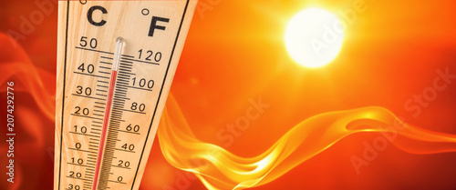 Fotografie Thermometer showing high temperature during hot summer day