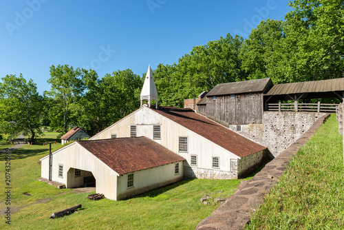 Cuadro en lienzo The restored Cast House at Hopewell Furnace National Historic Site in Pennsylvania, where molten iron was poured into molds to produce cast iron goods during the nineteenth century