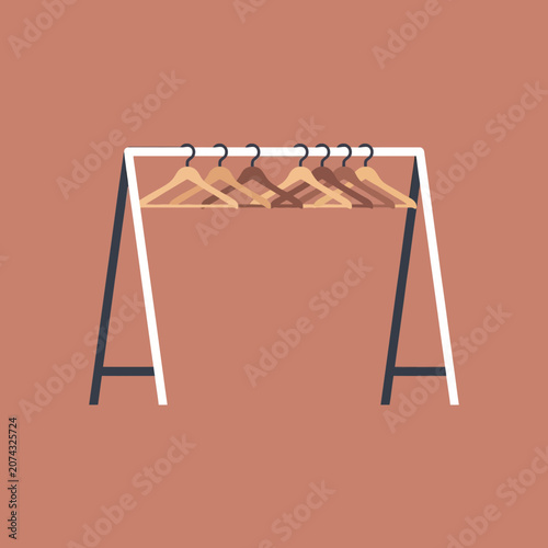 Cuadro en lienzo Empty wooden hangers hang on a modern clothing rack