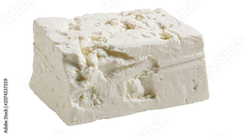 Obraz na plátne Block of crumbly white feta cheese with rough texture