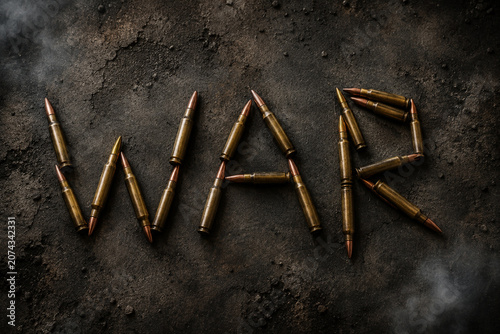 War word made from rifle cartridges on dark gritty surface