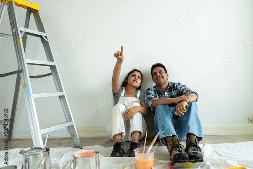 Couple renovating home together photo