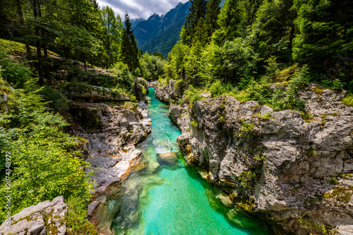 Obraz na plátně Soča or Isonzo River called Emerald River in Slovenia is a wild alpine river wit