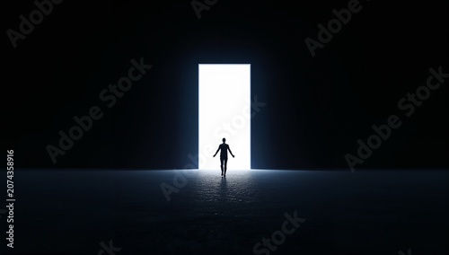 Person Standing in Front of Bright Open Doorway with Light in Dark Space