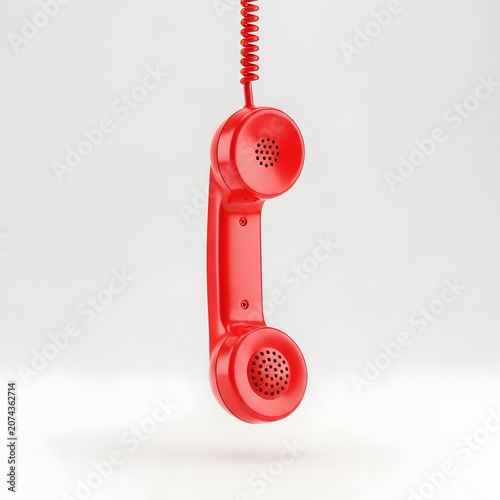 Suspended red telephone handset with cord communication concept