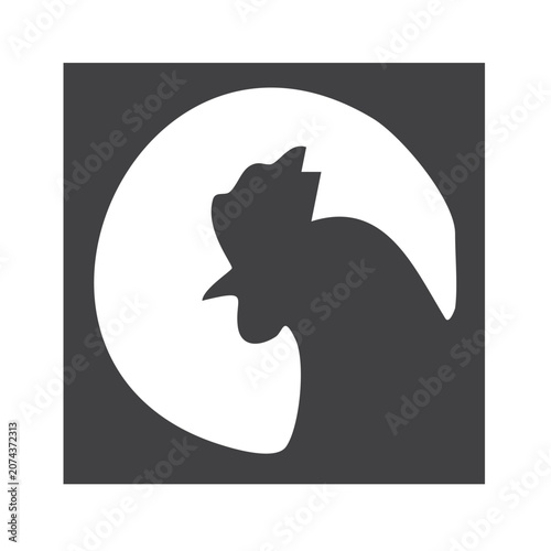 Silhouette of a Rooster in Profile with Bright Background