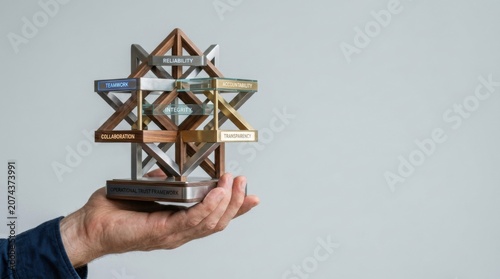 Person holding a trophy representing achievement and success in personal and professional endeavors
