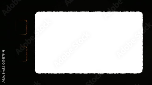 Super 8 film Effect. Suitable for cinematic projects and design elements. Vintage border of sixteen millimeter film frame on dark background for creative visuals.