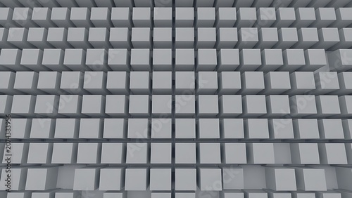 An infinite grid of identical, square, grey cubicles from a top-down view.