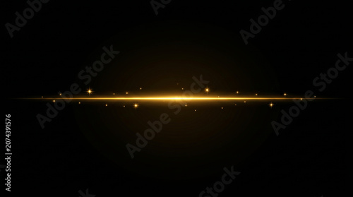 horizontal golden light flare effect with glowing particles on black background