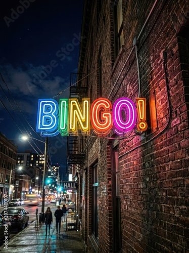 Vibrant Neon BINGO Sign Illuminates City Street at Night.