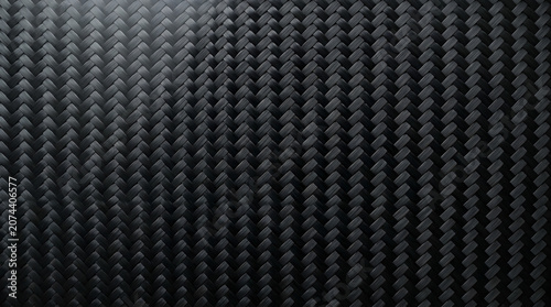 Carbon Fiber Texture: A close-up view of a dark, woven carbon fiber material, showcasing its intricate pattern and textured surface.