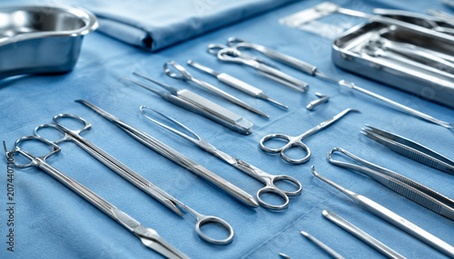 Surgical instruments realistic close up on sterile blue drape for operating room and medical procedure