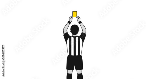 Soccer referee showing a yellow card during a professional football match.