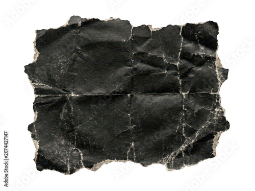 A Weathered Piece Of Distressed Black Paper With Torn Rough Jagged Edges