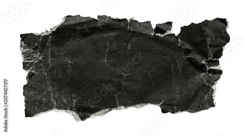 A Grungy Black Paper Scrap With Rough Torn Edges 