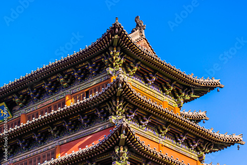 Datong, China - May 9 2026: The imposing façade of Datong Drum Tower showcases traditional Chinese architecture with elegant wooden construction, layered roofs, and enduring historical grandeur