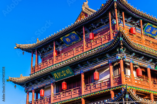 Datong, China - May 9 2026: The imposing façade of Datong Drum Tower showcases traditional Chinese architecture with elegant wooden construction, layered roofs, and enduring historical grandeur