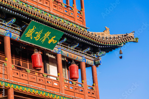 Datong, China - May 9 2026: The imposing façade of Datong Drum Tower showcases traditional Chinese architecture with elegant wooden construction, layered roofs, and enduring historical grandeur