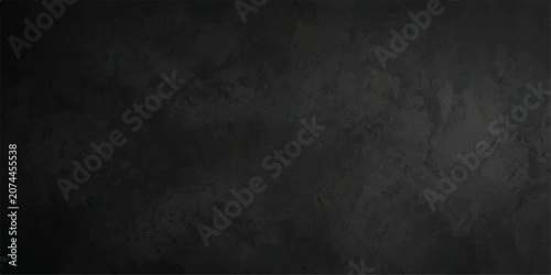 Mottled black stone texture background with rugged slate surface for bold packaging and label layout design