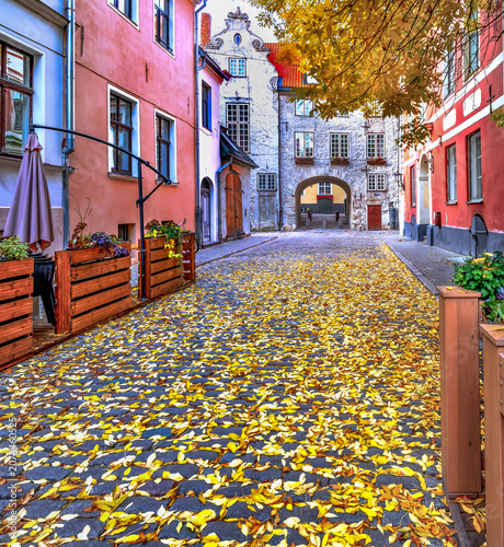 Autumn in medieval street in old town of Riga - the capital and largest city ...