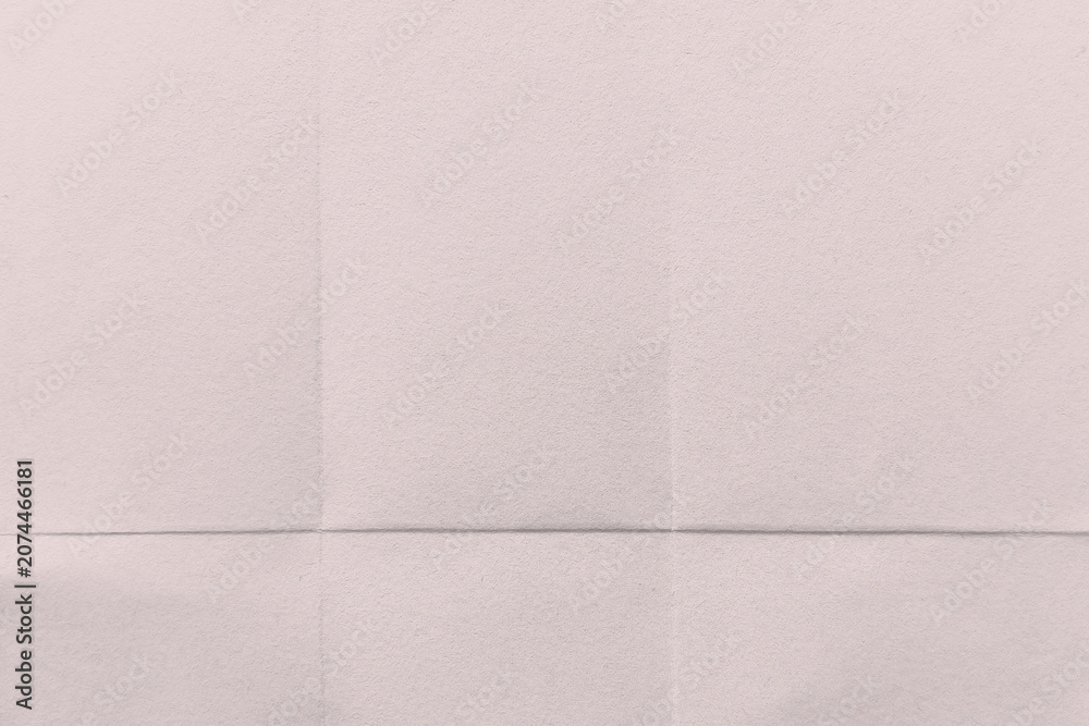 Fototapeta premium Textured pale pink paper background