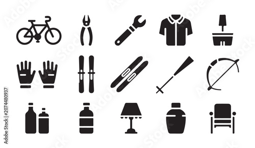 Foto Assorted gear for outdoor activities including cycling, skiing, and archery