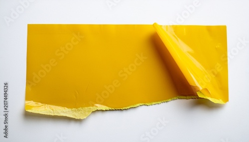 ripped torn paper adhesive yellow masking tape on white background
