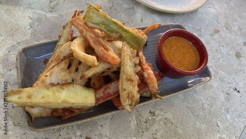 Crispy vegetable tempura served with traditional Romesco sauce