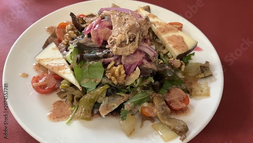 Gourmet green asparagus salad with foie gras close up