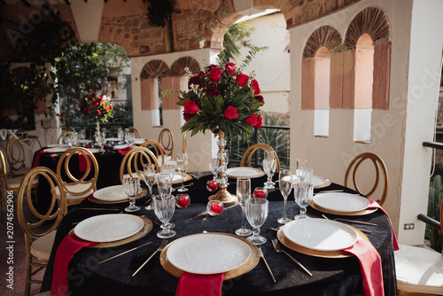 elegant table with a rose centerpiece