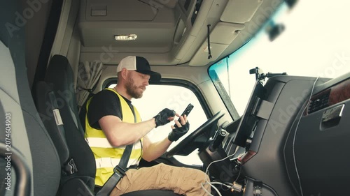 Truck driver using a smartphone for navigation