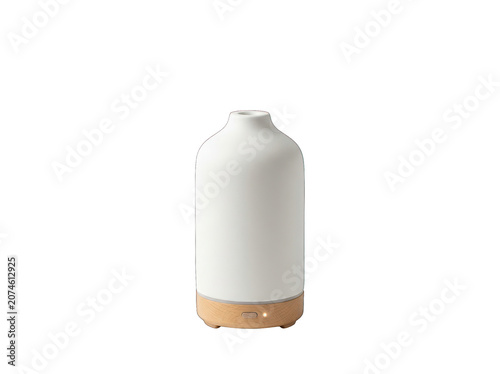 White ceramic oil diffuser isolated on a transparent background. Ideal for aromatherapy, home fragrance, wellness, spa, interior decor, product mockups, and lifestyle design projects.