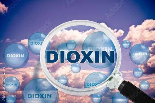 Fotografie DIOXIN AIR POLLUTION CONCEPT WITH MAGNIFYING GLASS AND FLOATING MOLECULES IN THE