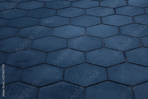 Dark Blue Hexagonal Concrete Pavers Creating a Geometric Urban Pavement Background