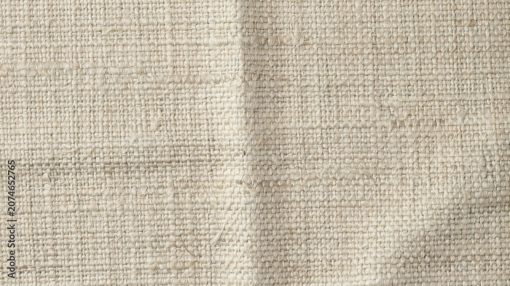 Fototapeta premium Beige fabric texture, linen background, natural fiber cloth, woven material