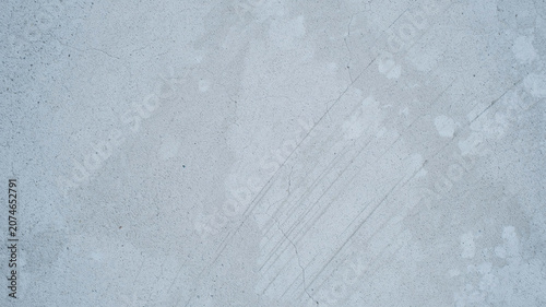 Grey, scratched concrete texture, industrial background, rough surface