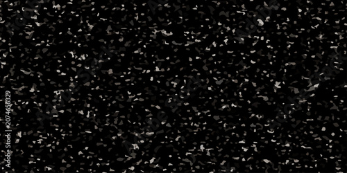 Fotografie Black asphalt texture with white speckled stone particles, dark seamless pattern