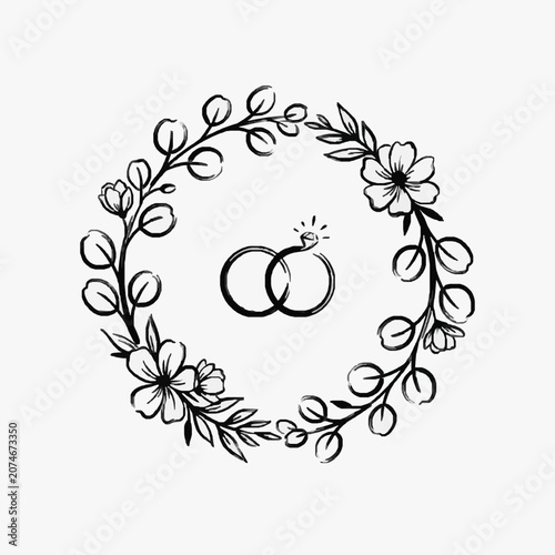 Hand drawn floral wreath with wedding rings in the center.