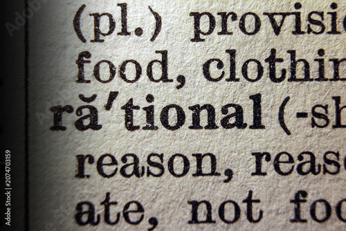 Photos Word rational on dictionary page, macro close up