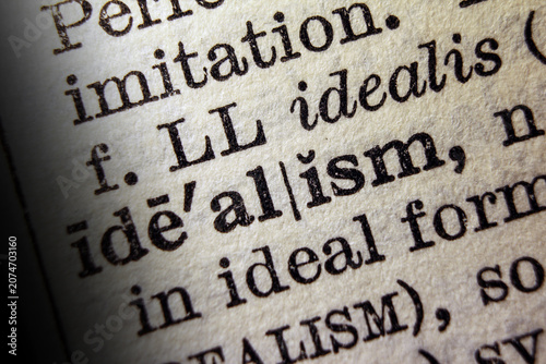 Tableau sur toile Word idealism on dictionary page, macro close up