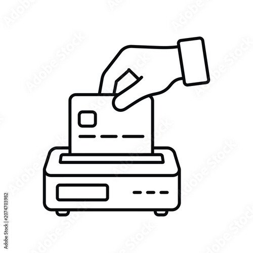 A hand putting a credit card into a payment terminal machine