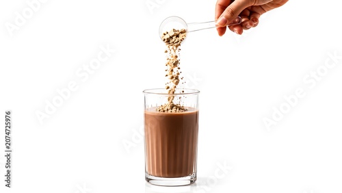 Indulge in a rich chocolate milk treat being expertly poured into a clear glass with isolated on white background, perfect for a sweet snack or dessert.