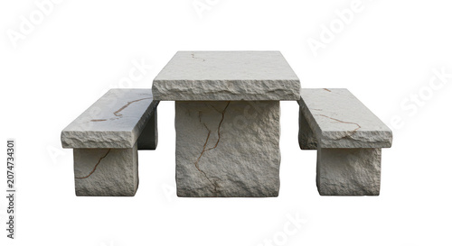 Stone picnic table with attached benches rough texture.