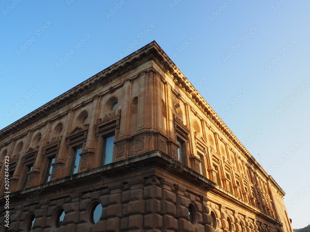 Obraz premium Classic European Building with Perspective View against Blue Sky