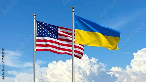 American and Ukrainian flags waving together against a bright blue sky