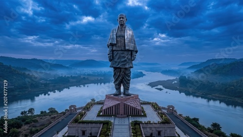 Bronze Statue Against Dramatic Evening Sky
