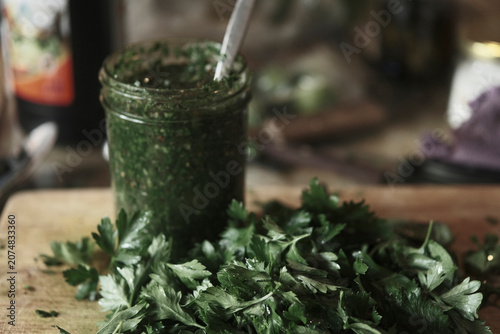 Fotografie Chimichurri wit a lot of parsley