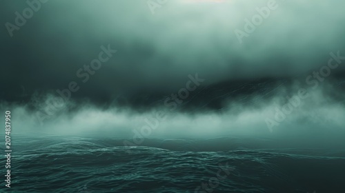 Atmospheric low mist hovering over dark, choppy water with a subtle light source above